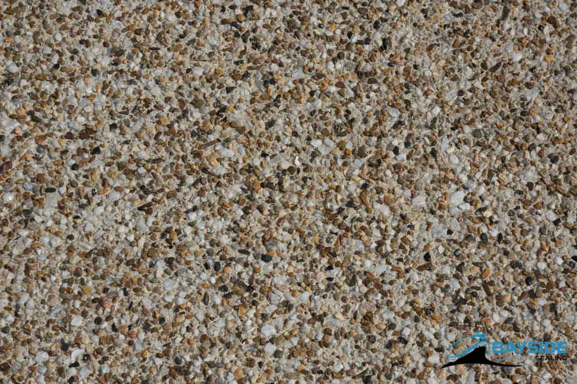 Professional exposed aggregate sealing finish on a residential Melbourne outdoor surface